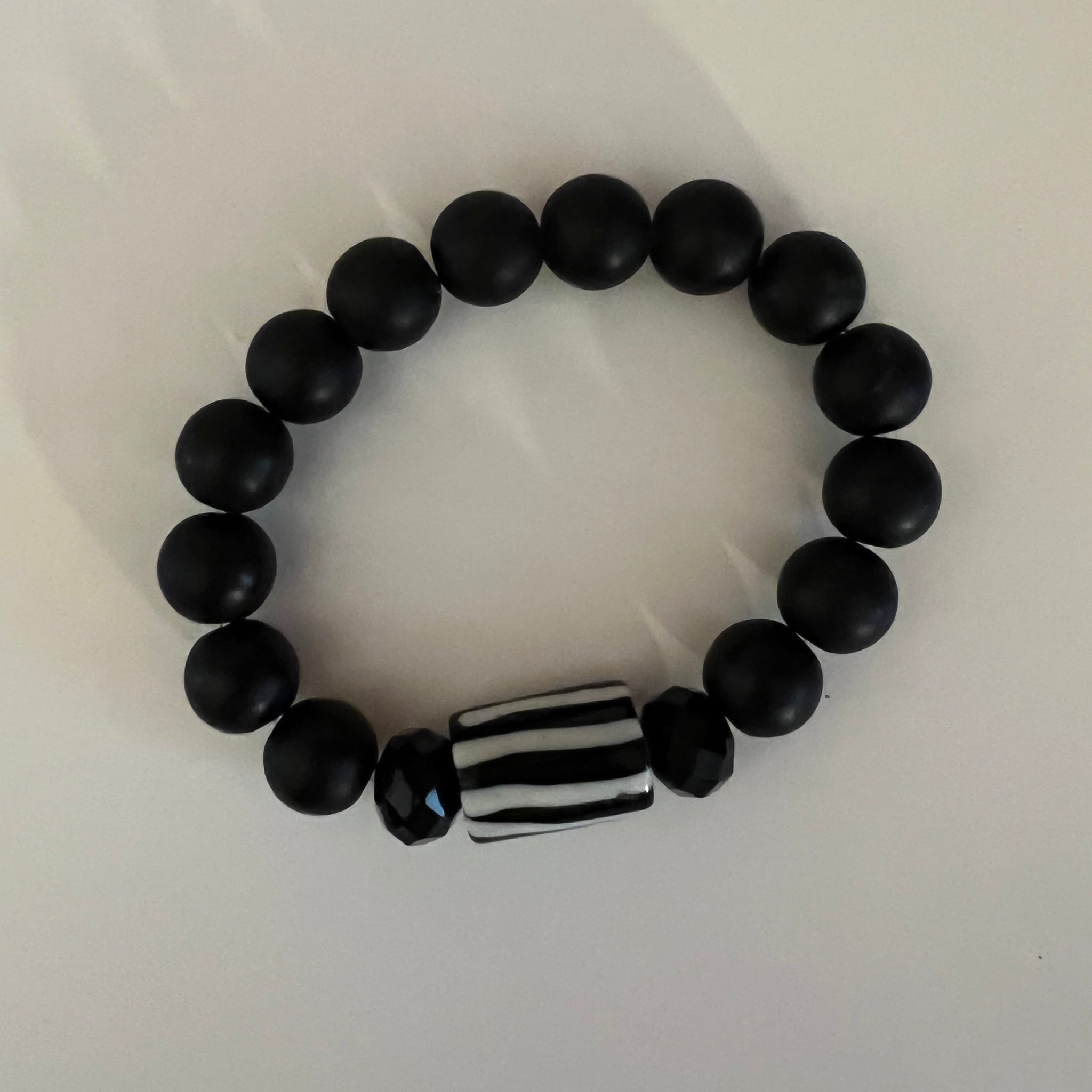 Buy DENICRAAS black and white marble matte bracelet plan at Amazon.in